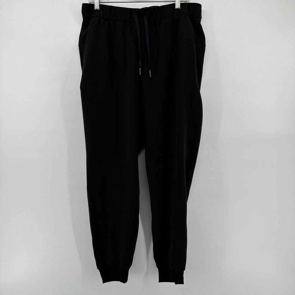Lululemon On The Fly Jogger Pants Black Size 10 Drawstring Tapered Leg EUC